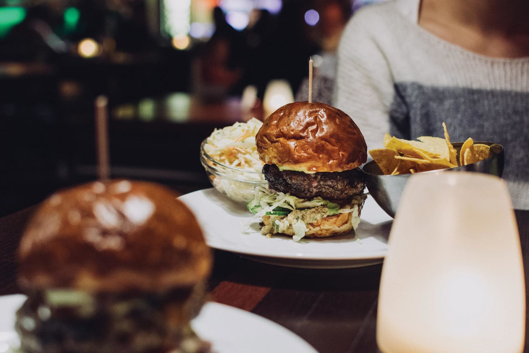 cheeseburger on plate at restaurant